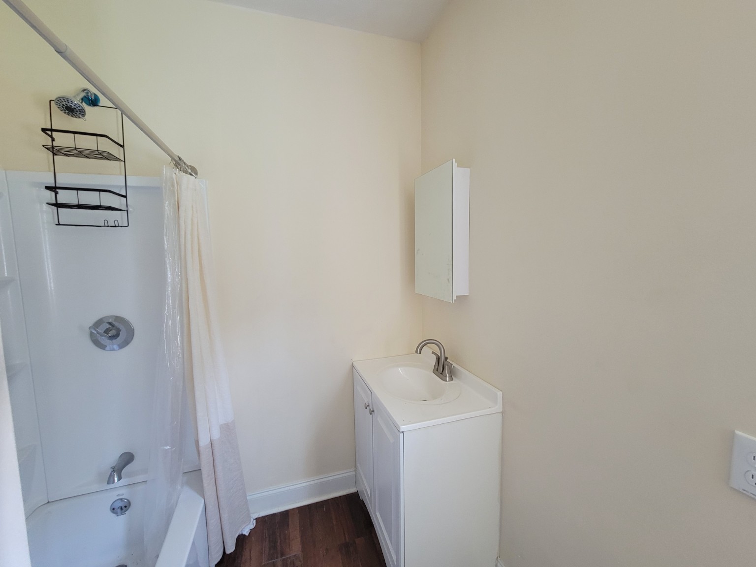 Primary Bathroom — Vanity and Tub/Shower